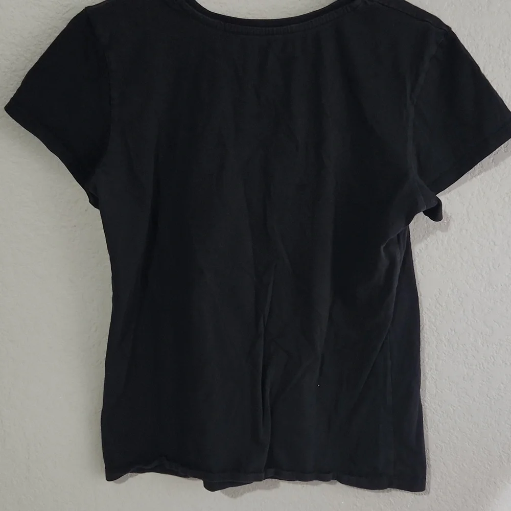 Philadelphia Eagles Shirt size L has cracks in graphics Faded black Flaw